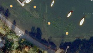 Fig. 3: A satellite image of Shelburne Shipyard showing the four steamer wrecks. From left to right: A. Williams, Phoenix II, Burlington and Whitehall. (Bing Maps, 2013).