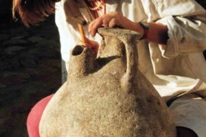 One of the stirrup jars being cleaned of concretion in the conservation laboratory in the Bodrum Museum of Underwater Archaeology. (Photo: INA) Slide# CG521.