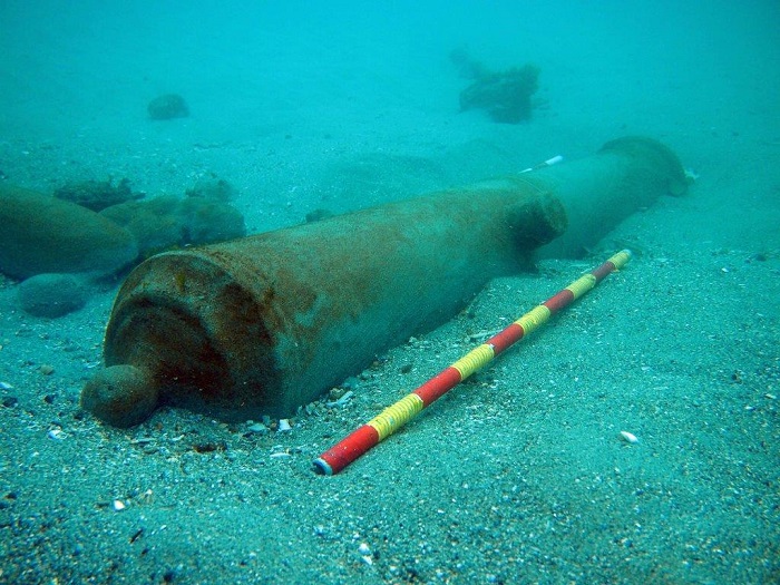 Another bronze cannon exposed by the sea action.
